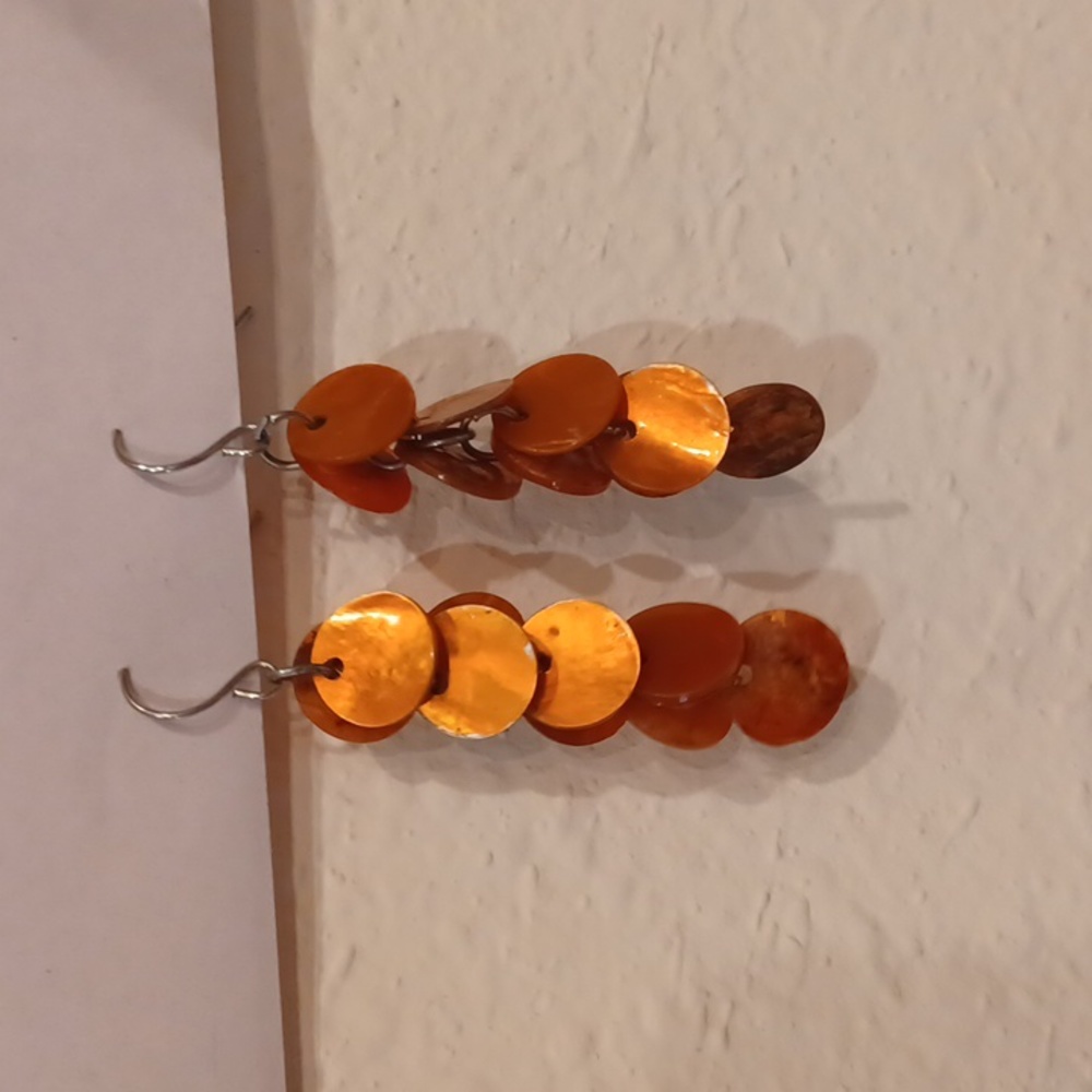 Orange shell dangling earrings